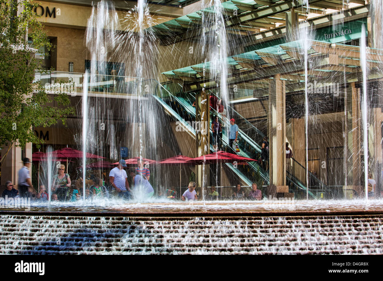 Water fountain shopping mall. Decorative fountain with dancing water in