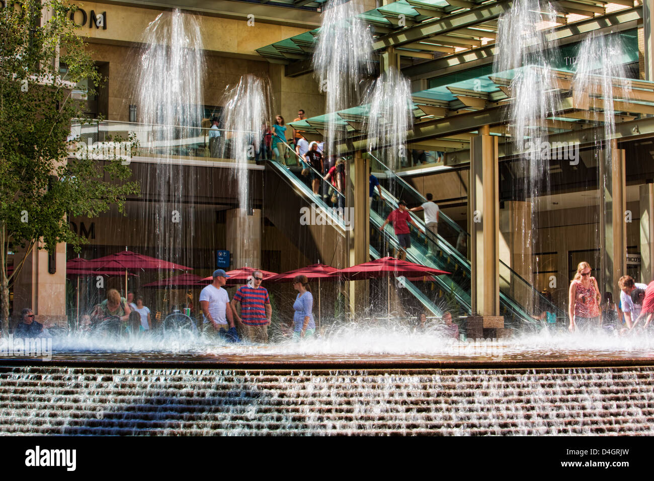 Water fountain shopping mall. Decorative fountain with dancing water in
