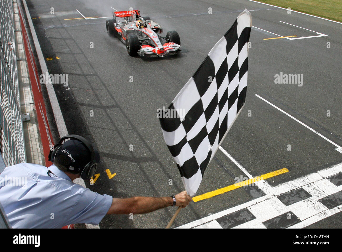 British Formula One driver Lewis Hamilton of McLaren Mercedes passes