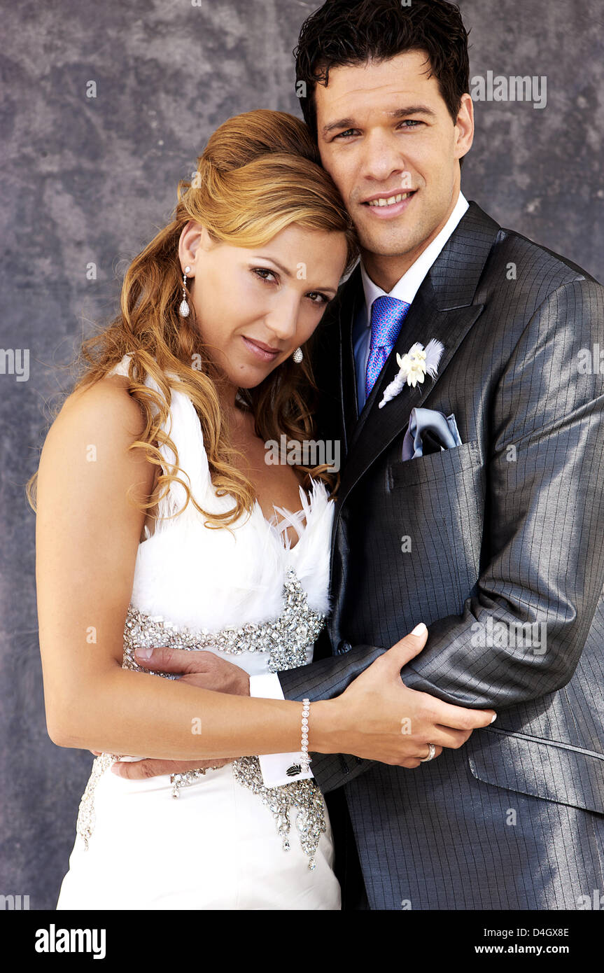 Newlyweds Simone Lambe and German soccer international Michael Ballack pose  for photographer Gabo at the wedding party at 'Bayerischer Yacht-Club'  (lit: 'Bavarian Yacht Club') on the shores of Lake Starnberg in Starnberg,