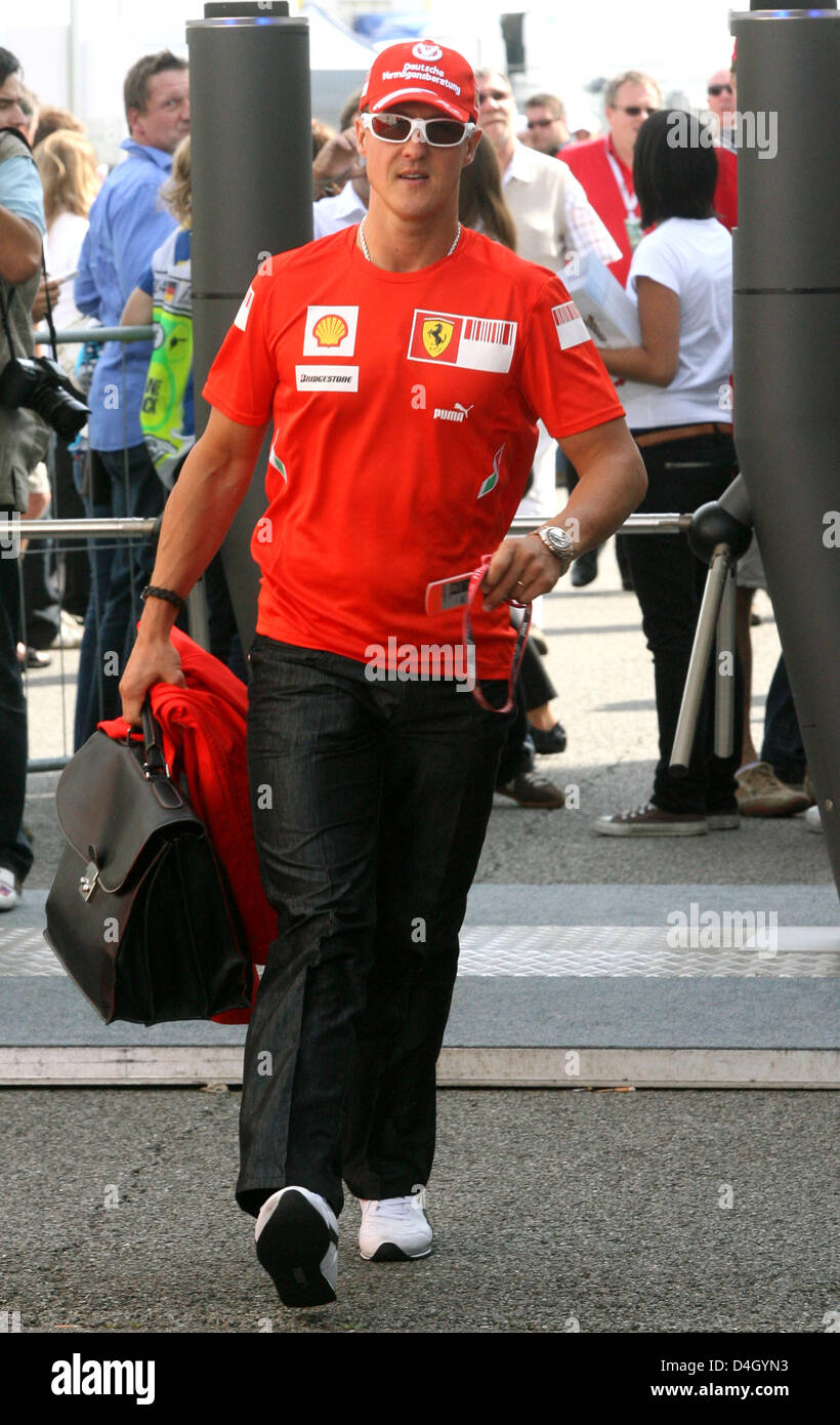 German Michael Schumacher, consultant for Scuderia Ferrari and former  seven-times Formula One world champion, enters
