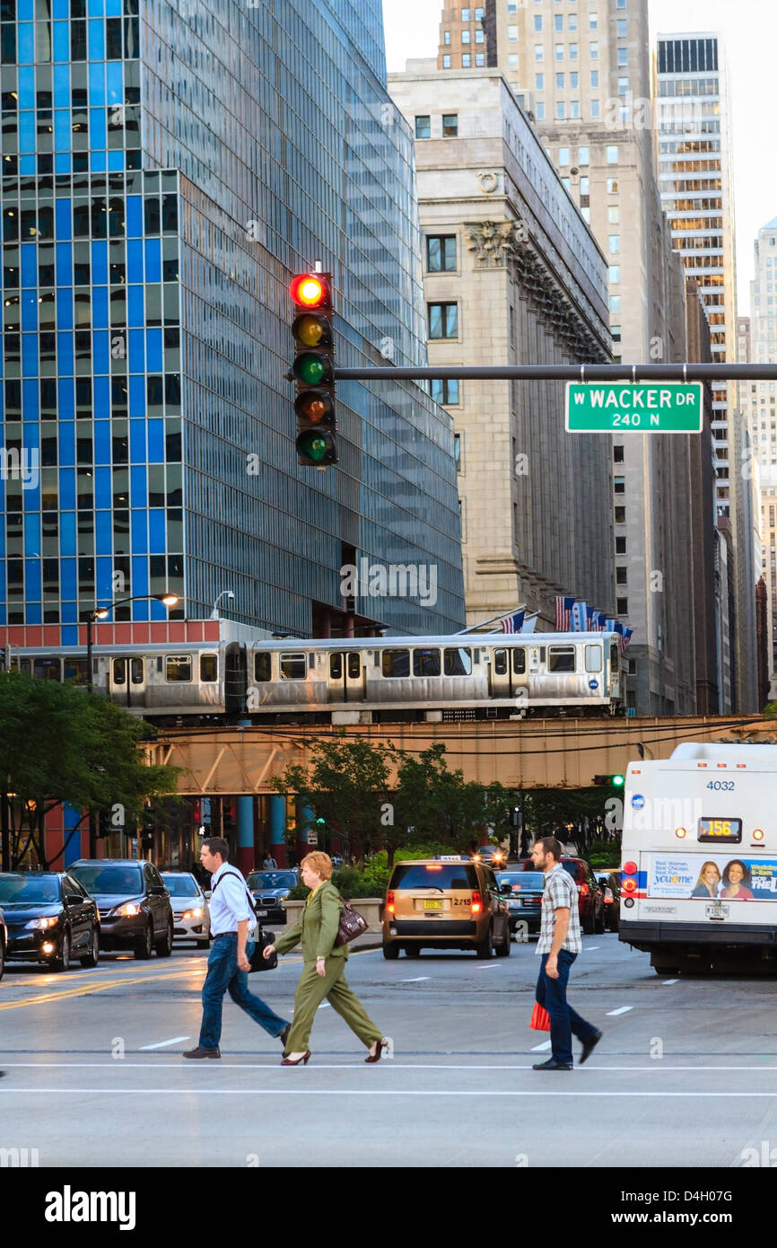 L train on elevated track crosses South LaSalle Street in the Loop district, Chicago, Illinois, USA Stock Photo