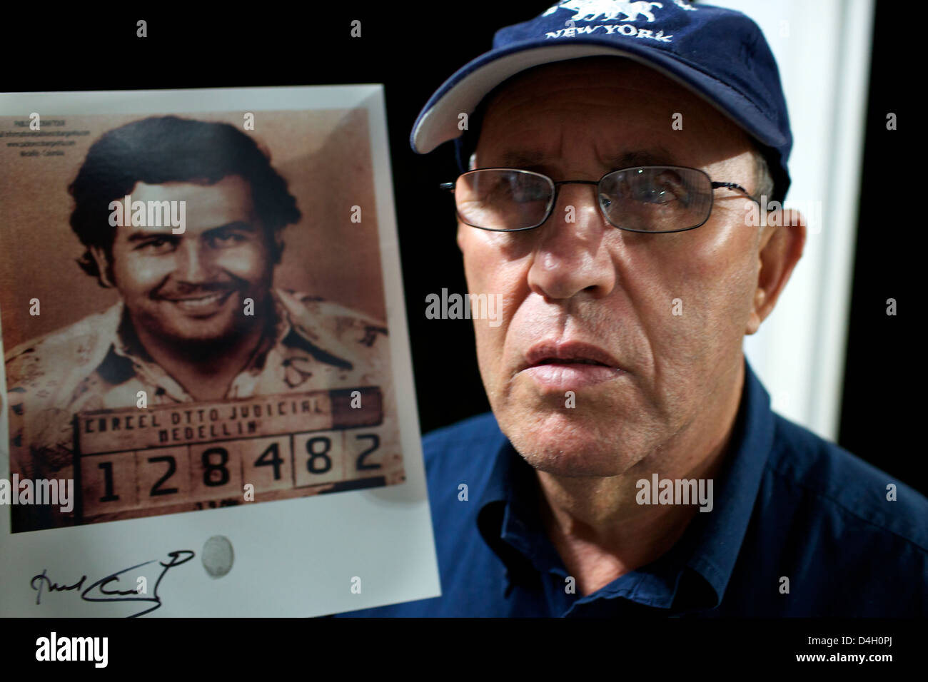 Roberto Escobar with a picture of his brother Pablo, Medellin, Colombia, South America Stock Photo