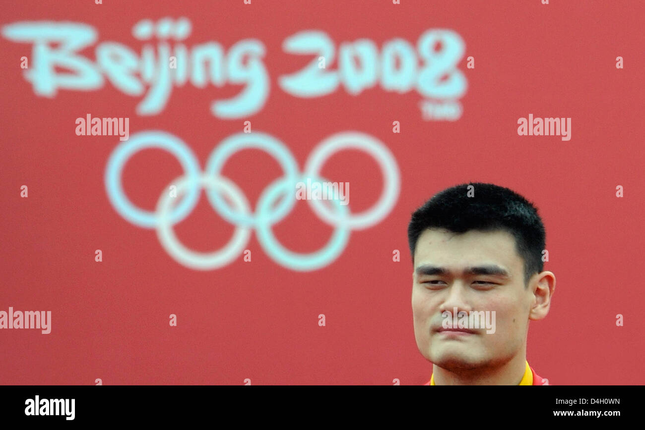 Chinese basketball star Yao Ming is pictured at the opening ceremony of the Olympic village in Beijing, China, 27 July 2008. Some 16,000 athletes, coaches and officials will live in 42 buildings in the Olympic village. The Beijing 2008 Olympic Games will run from 08 until 24 August in China. Photo: Gero Breloer Stock Photo
