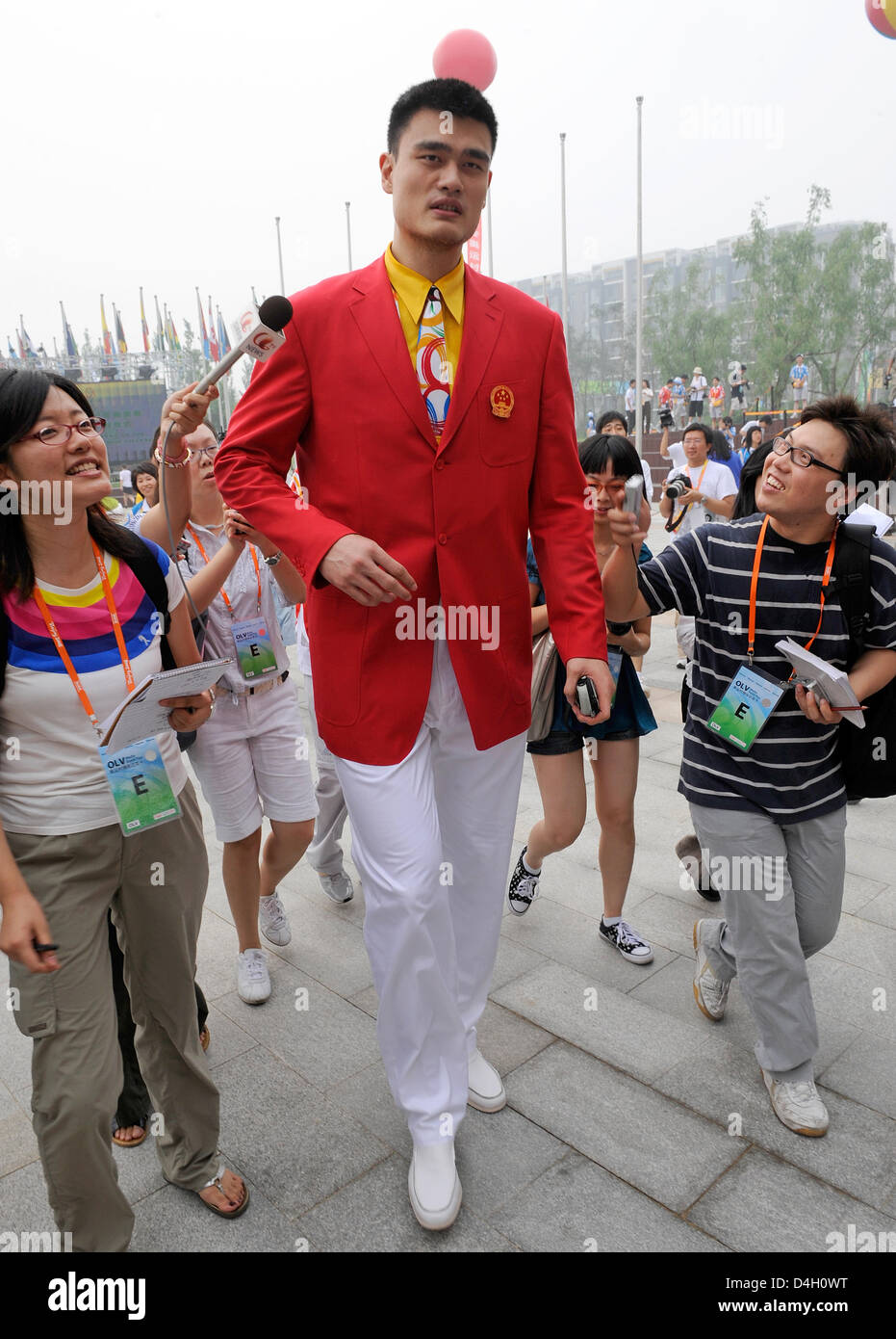 Chinese basketball star Yao Ming (C) is pictured at the opening ceremony of the Olympic village in Beijing, China, 27 July 2008. Some 16,000 athletes, coaches and officials will live in 42 buildings in the Olympic village. The Beijing 2008 Olympic Games will run from 08 until 24 August in China. Photo: Gero Breloer Stock Photo