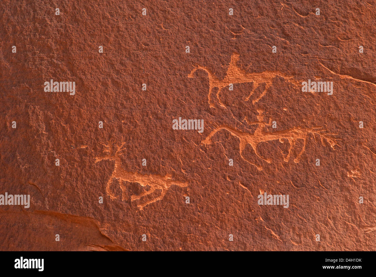 Petroglyphs of riders on horseback hunting an antelope, Canyon de