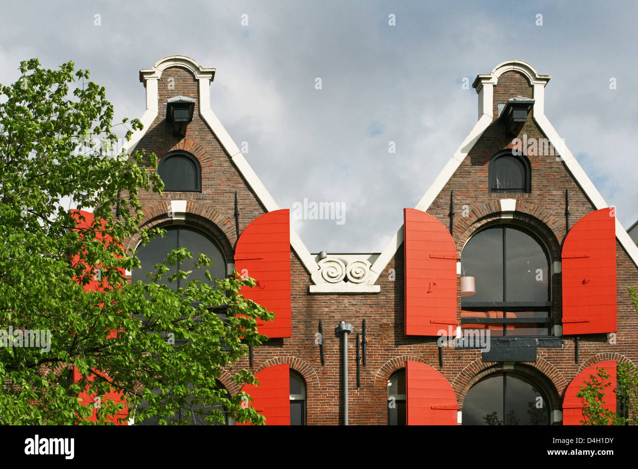 The Netherlands Holland Amsterdam Prinsengracht 211-217 Spout Gable Warehouse ± 1690 Golden Age Canal district Apartment Red Stock Photo