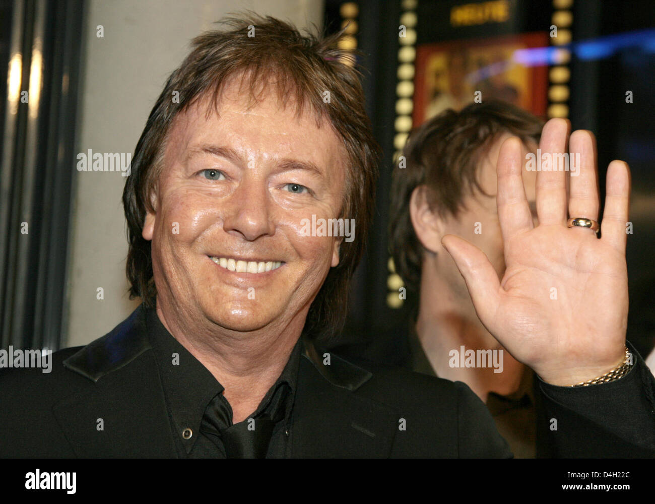 British singer Chris Norman, former singer of the band 'Smokie', greets guests at the premiere of the motion picture 'Selbstgespraeche ('Come in and Burn Out') at 'Kulturbrauerei' cinema in Berlin, Germany, 31 July 2008. Chris Norman has a guest role in the film portraying the situation in a call centre. The film will be shown at German cincemas from 31 July 2008 onwards. Photo: Je Stock Photo