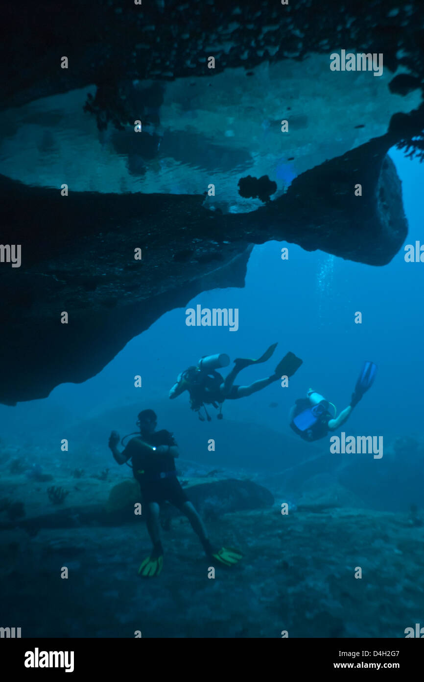 Scuba divers in underwater cave, Southern Thailand, Andaman Sea, Indian ...