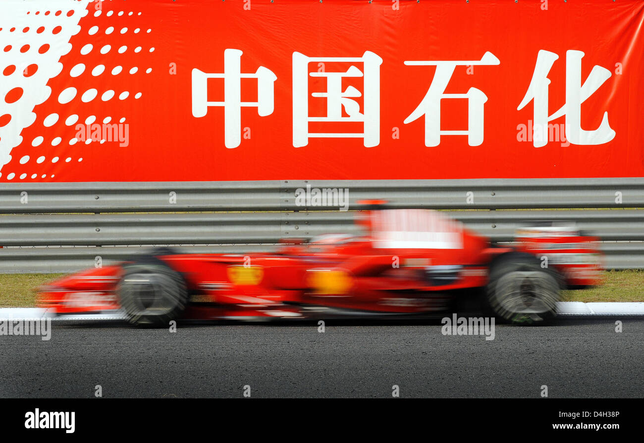 Finnish Formula One driver Kimi Raikkonen of Scuderia Ferrari steers