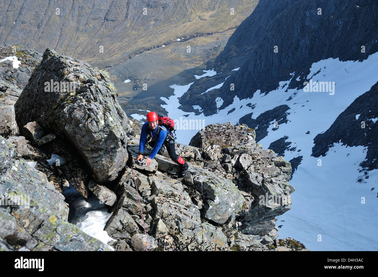 Climber ascending the Great Tower on Tower Ridge, Ben Nevis, a classic and popular route, summer and winter Stock Photo