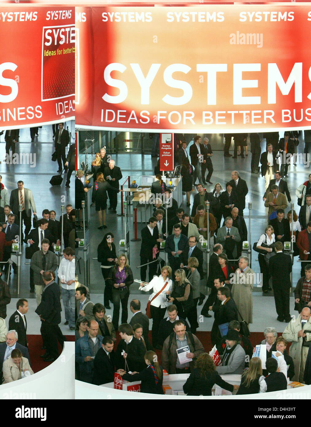 Visitors seen at the computer trade fair 'Systems' in Munich, Germany, 21 October 2008. The number of exhibitors has again decreased with 1061 companies presenting their latest products in the computer services, software and tele communication sector. 'Systems' opens until 24 Ocotber 2008. Photo: Frank Leonhardt Stock Photo