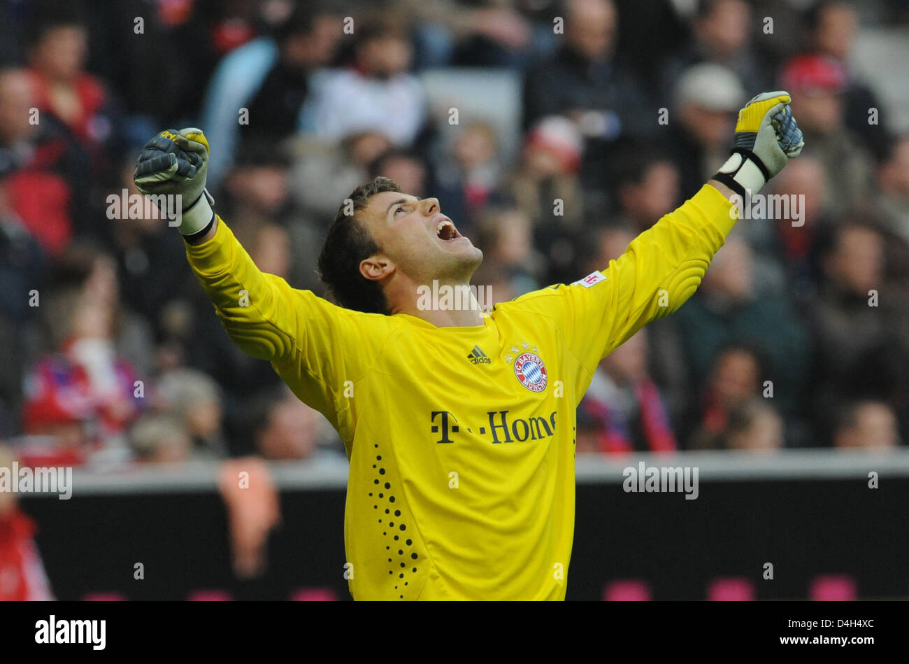 FC Bayern Munich goalkeeper Michael Rensing cheers after his team 4-2 ...