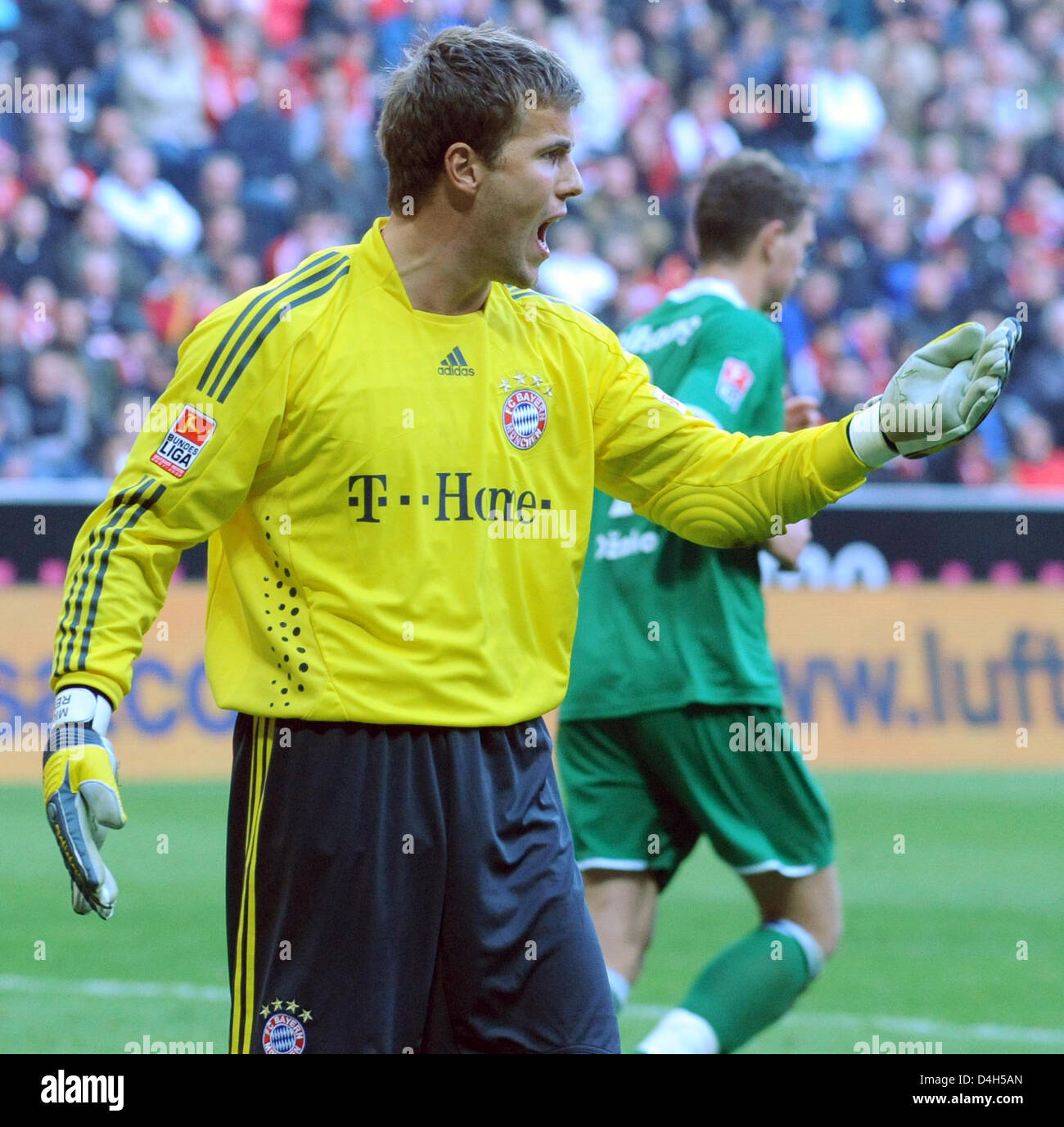 Munich's goalkeeper Michael Rensing gestures during the German ...