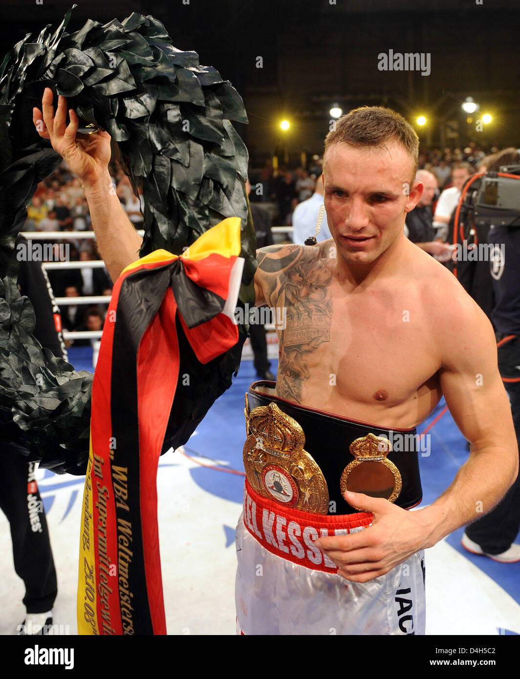 Old and new WBA-Super Middleweight World Champion Mikkel Kessler (Denmark) poses with his crown at Weser-Ems-Halle in Oldenburg, Germany, 25 October 2008. He beat 33 year-old German Danilo Haeussler from Frankfurt Oder by k.o. in the third round. Photo: Ingo Wagner Stock Photo
