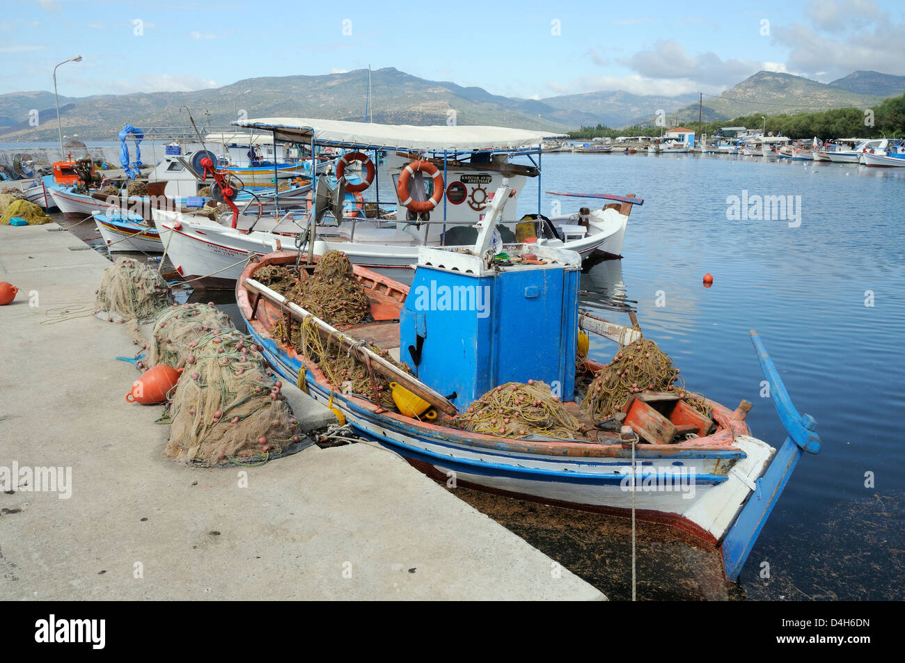 Traditional wooden fishing boats moored in Skala Kalloni harbour, Lesbos (Lesvos), Greek Islands, Greece Stock Photo
