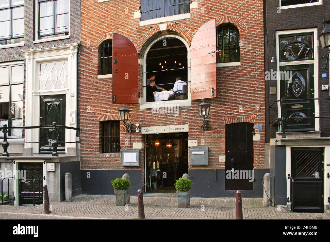 The Netherlands Holland Amsterdam Prinsengracht 999 Spout gable Original warehouse 1680Current function restaurant Stock Photo