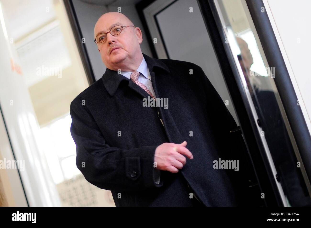 Property entrepreneur Josef Esch leaves the regional court in Cologne, Germany, 14 March 2013. Four former partners and a manager of the bank Sal. Oppenheim are accused of breach of trust and facilitation of infidelity. Photo: MARIUS BECKER Stock Photo