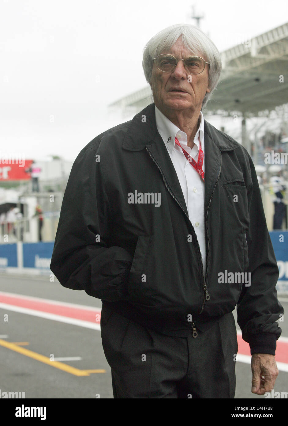 British F1 supremo Bernie Ecclestone strolls through the pitlane ahead ...