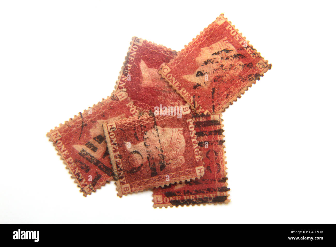 British penny red stamps on a white background. Stock Photo
