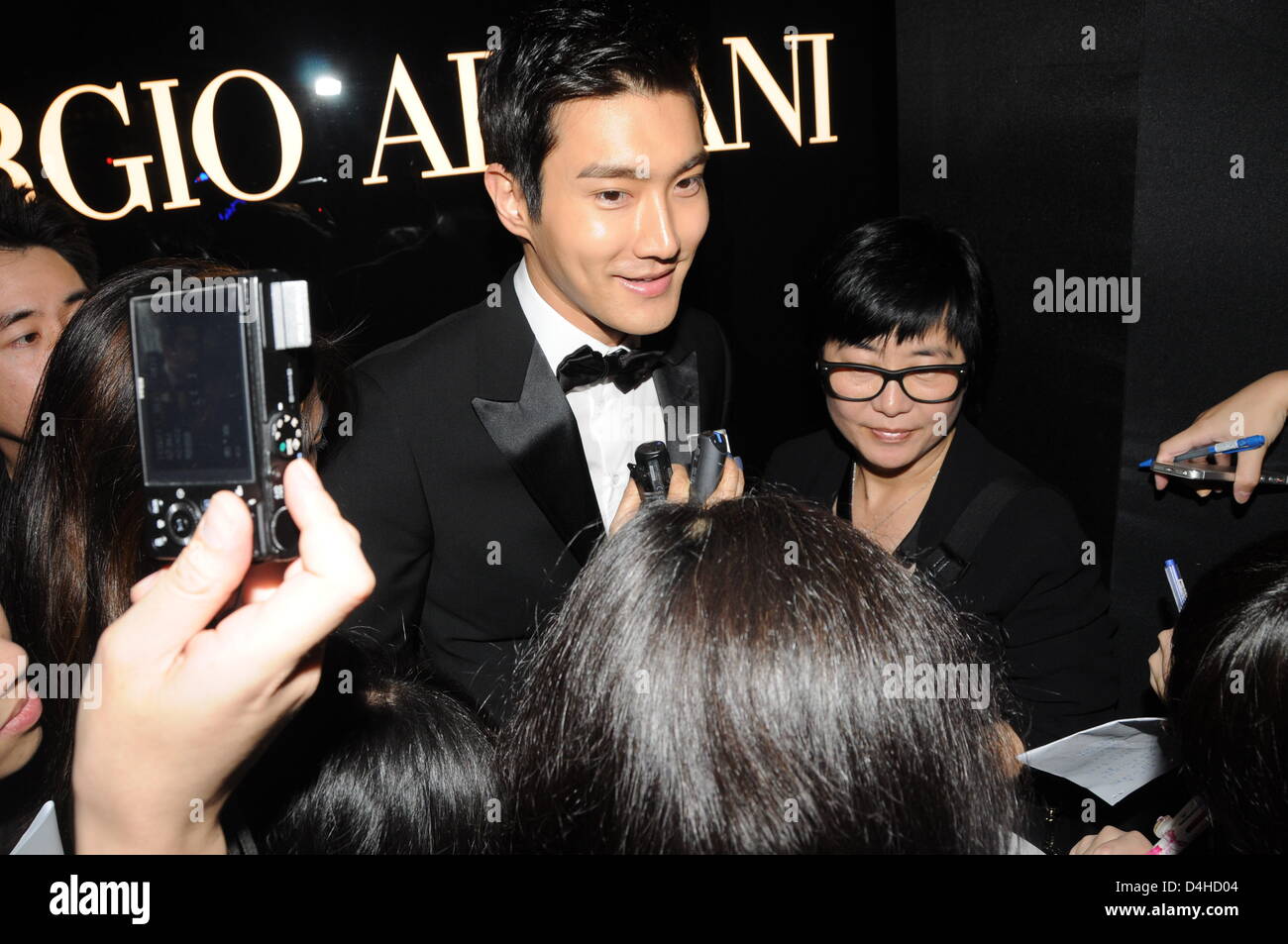 Choi Siwon at Giorgio Armani's new store opening ceremony in Hong Kong, China on Wednesday March 13, 2013. Stock Photo