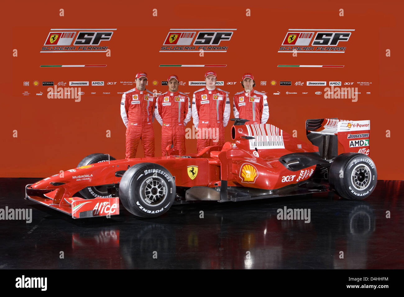 Test pilots Marc Gene (L) and Luca Badoer (R) and race drivers Felipe Massa (2-L) and  Kimi Raikkonen of ?Scuderia Ferarri? pose behind the new Ferrari F60 Formula One car for the upcoming 2009 season in Mugello, Italy, 12 January 2009. Photo: Ferrari Stock Photo