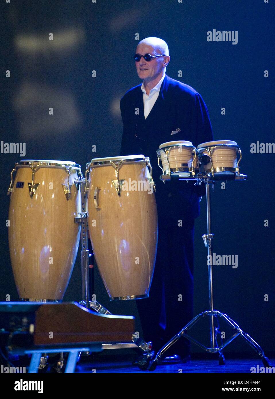 Drummer Ray Cooper performs during the German TV show ?Wetten, dass...?? (literally: I bet, that...) at Baden-Arena in Offenburg, Germany, 24 January 2009. The last time the TV show took place in Offenburg was in 1995. After the conferment of Germany?s Bambi awards in November 2008, the TV show is the second media mega event for Offenburg within just a few weeks. Photo: Patrick See Stock Photo