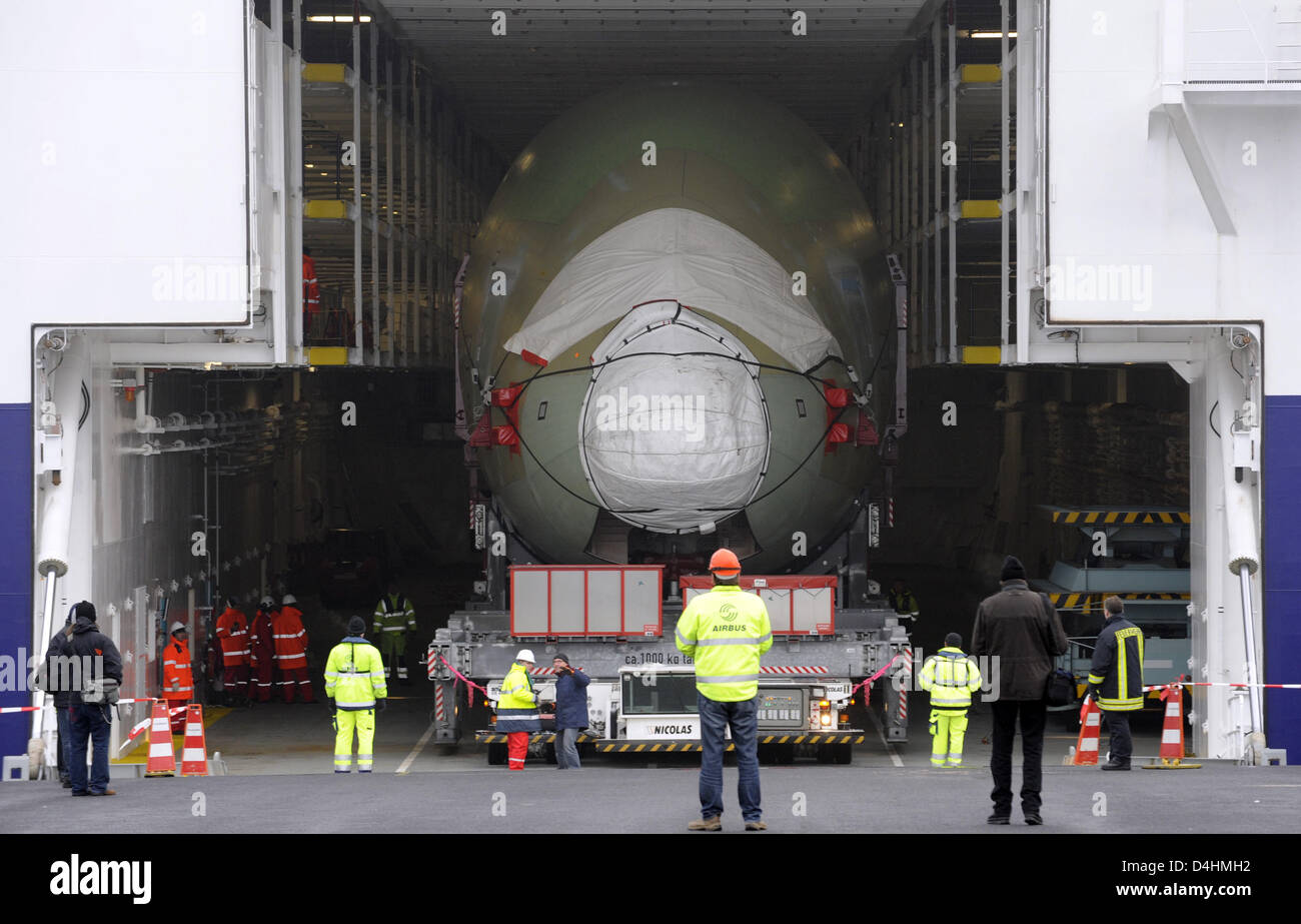 A cockpit segment of an Airbus A380 is unloaded off the new A380 ...