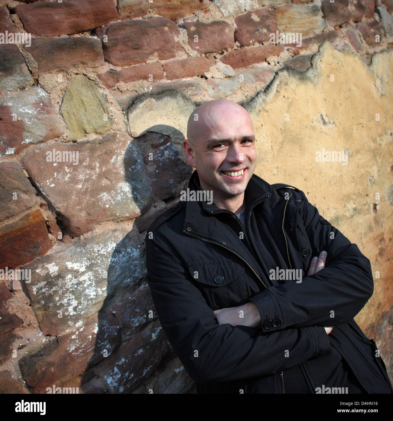 German filmmaker Jochen Alexander Freydank smiles in Saarbruecken