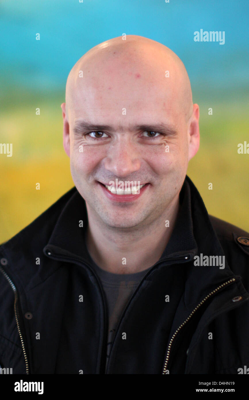 German filmmaker Jochen Alexander Freydank smiles in Saarbruecken