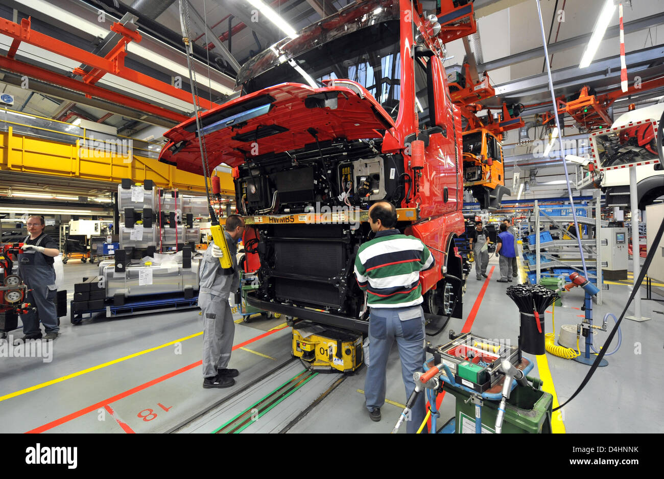 Employees of German engineering company MAN AG work in the
