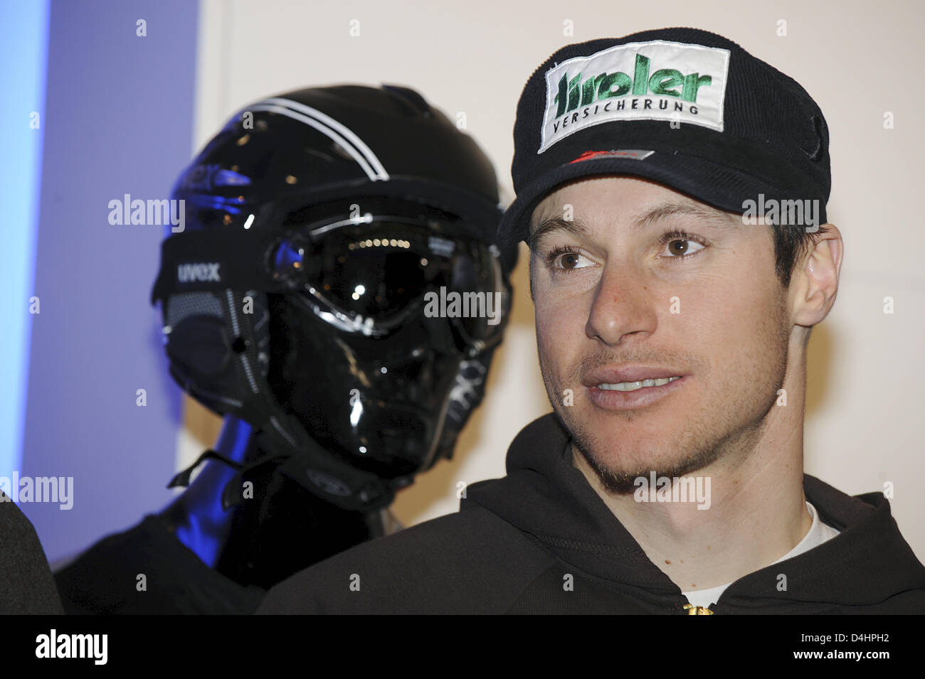 Austrian skier Manfred Pranger poses with a helmet of UVEX at the company?s trade fair stand to the sports articles trade fair ISPO in Munich, Germany, 02 February 2009. Photo: Peter Kneffel Stock Photo