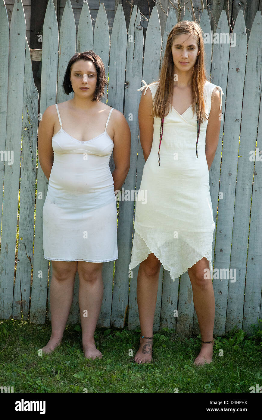 Two young white girls wearing vintage slips Stock Photo - Alamy
