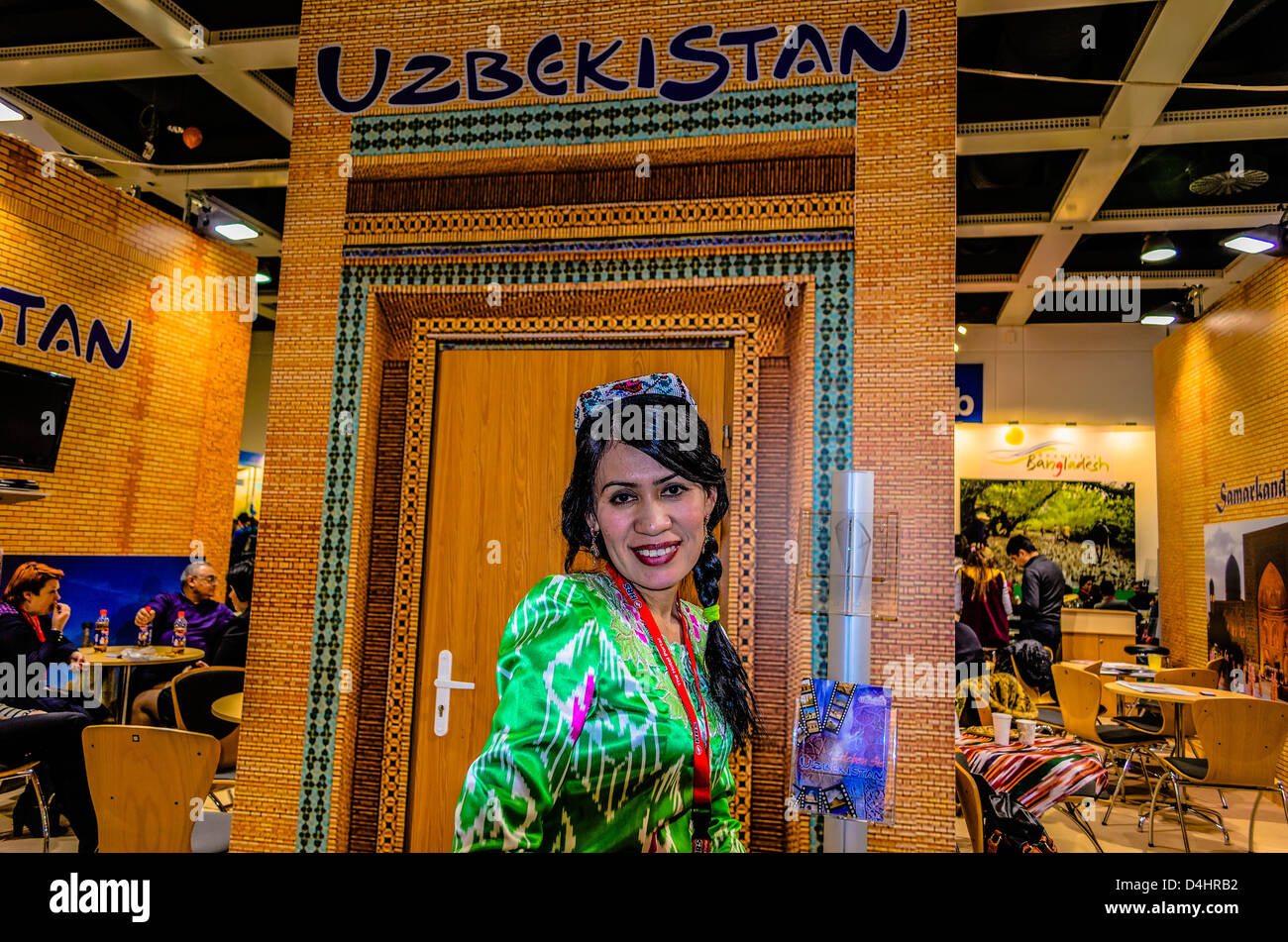 The World's Leading Travel Trade Show, Berlin, Germany, Smiling hostess at Uzbekistan pavilion Stock Photo