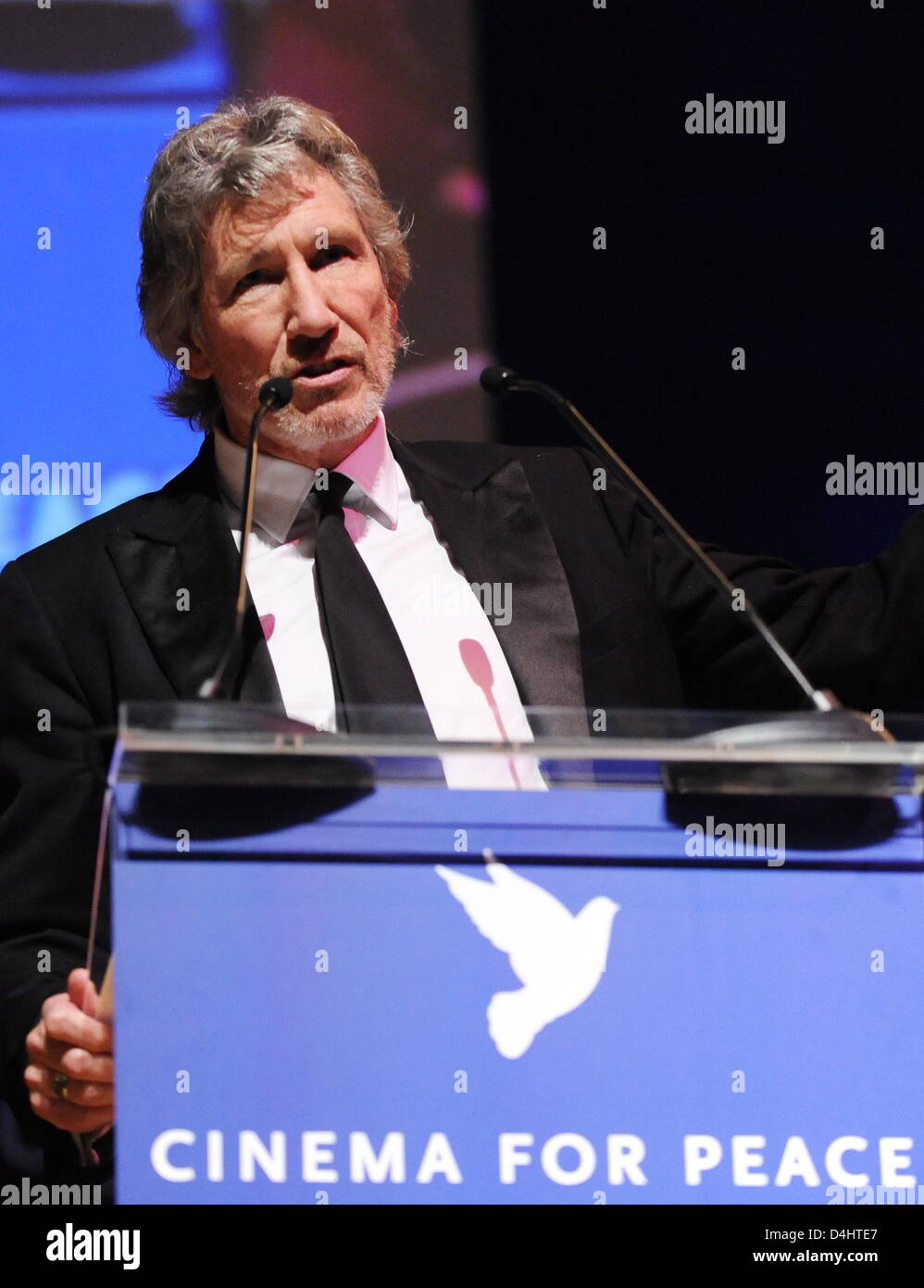 Pink-Floyd bassist Roger Waters speaks at the ?Cinema for Peace? gala at the 59th Berlin International Film Festival in Berlin, Germany, 09 February 2009. ?Cinema for Peace? is a worldwide initiative promoting humanity through film. Members of the international film community have created a platform for peace and tolerance. Screenwriters, directors and producers are celebrated with Stock Photo