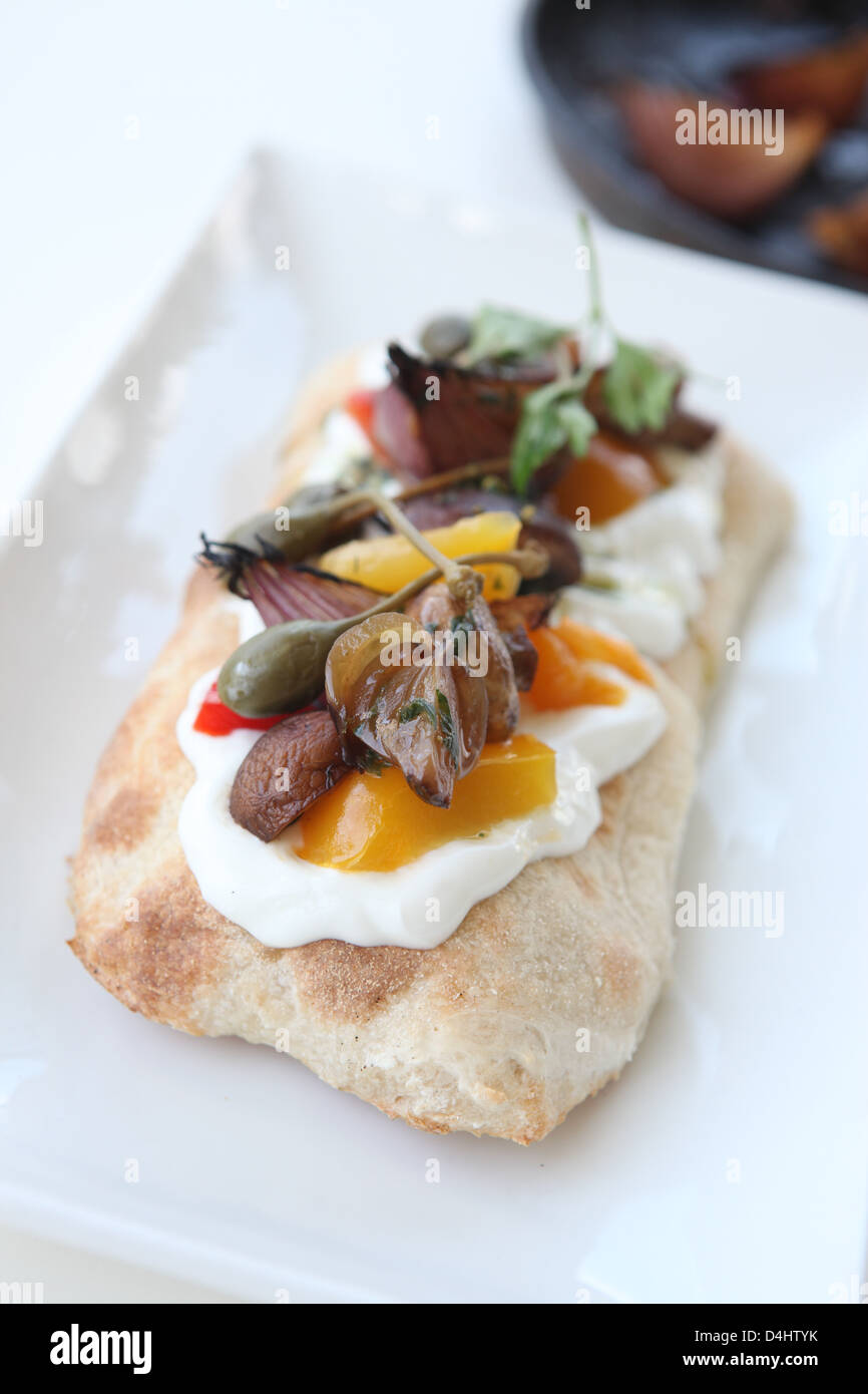 Italian style Antipasti on a Focaccia with cheese Stock Photo Alamy