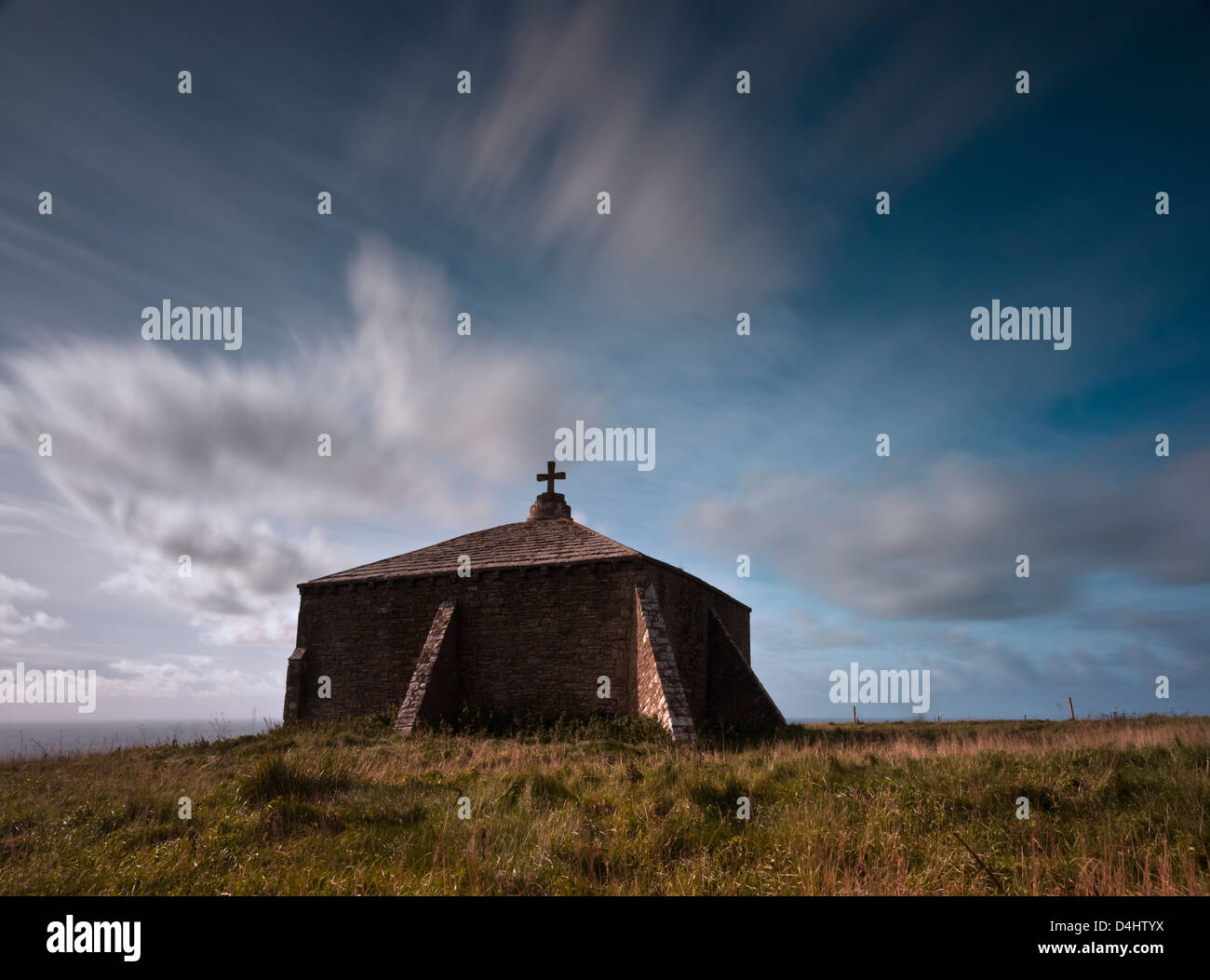St Aldhelm's Chapel is a Norman chapel on St Aldhelm's Head in the parish of Worth Matravers, Swanage, Dorset. Stock Photo