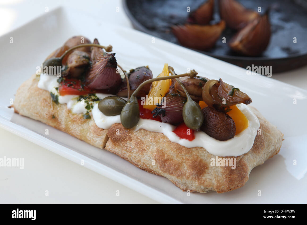 Italian style Antipasti on a Focaccia with cheese Stock Photo Alamy