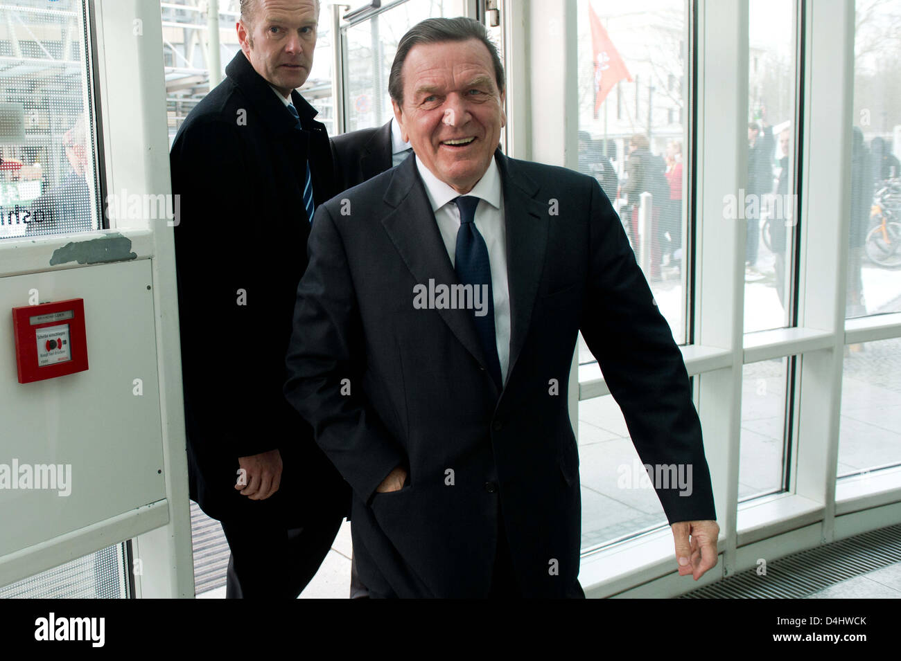 Former German Chancellor Gerhard Schroeder arrives for the conference ...
