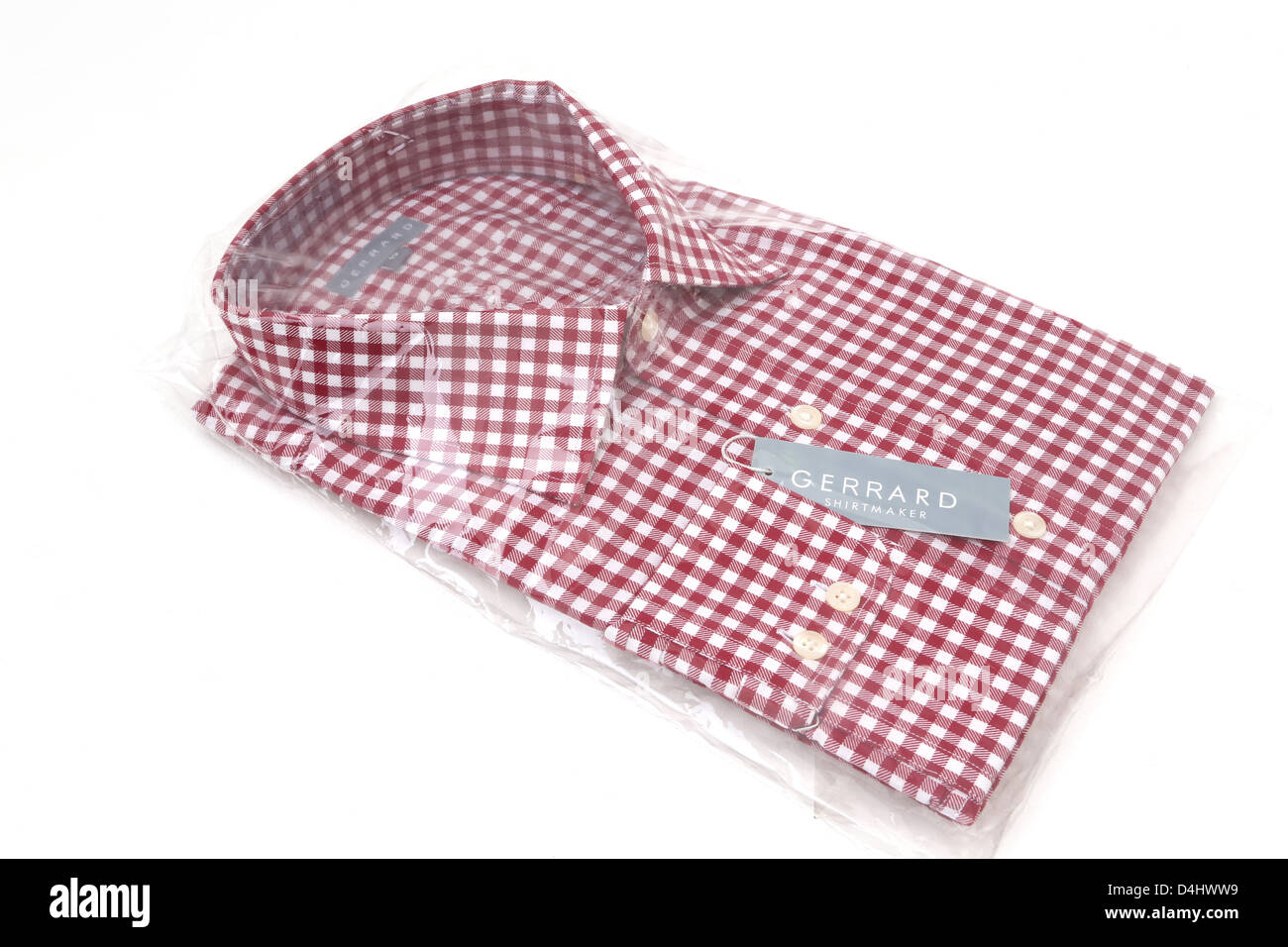 Gerrard Red And White Checkered Shirt Folded Up In Plastic Stock Photo