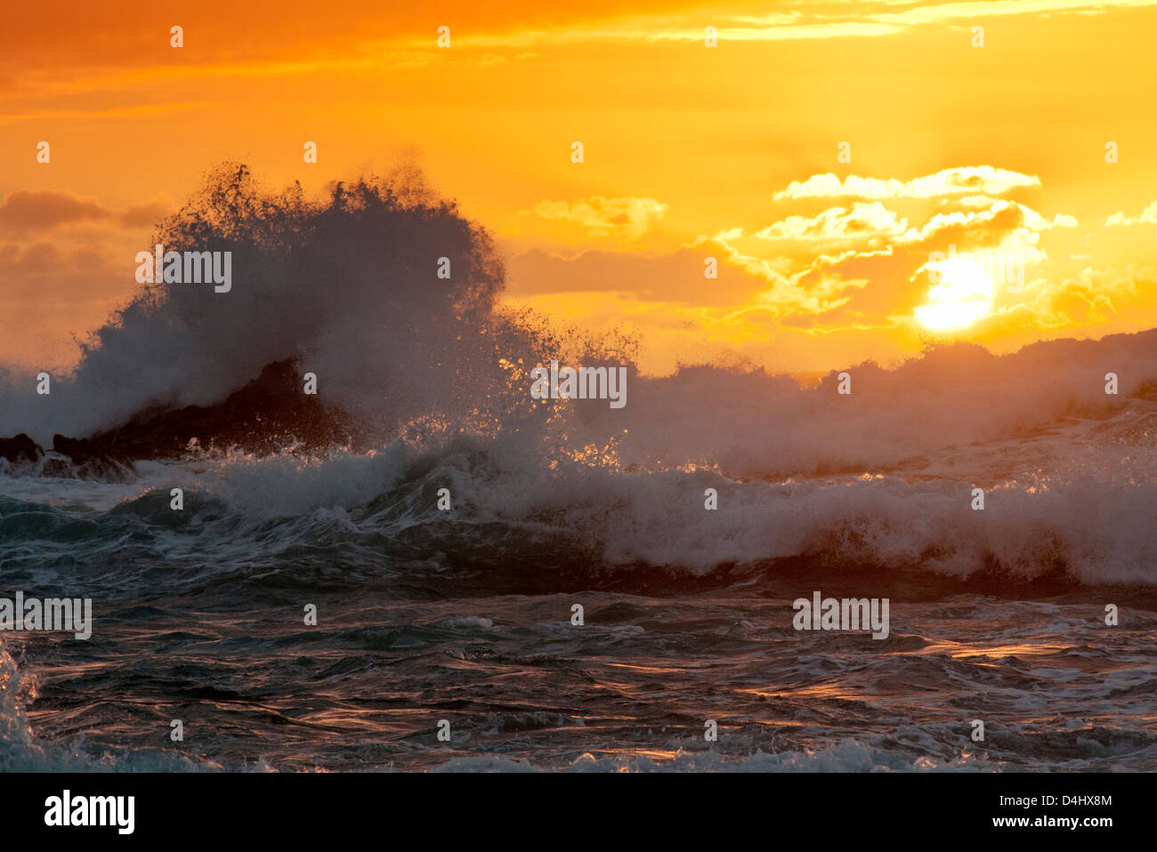 breaking waves at sunset El Cotillo Fuerteventura Stock Photo