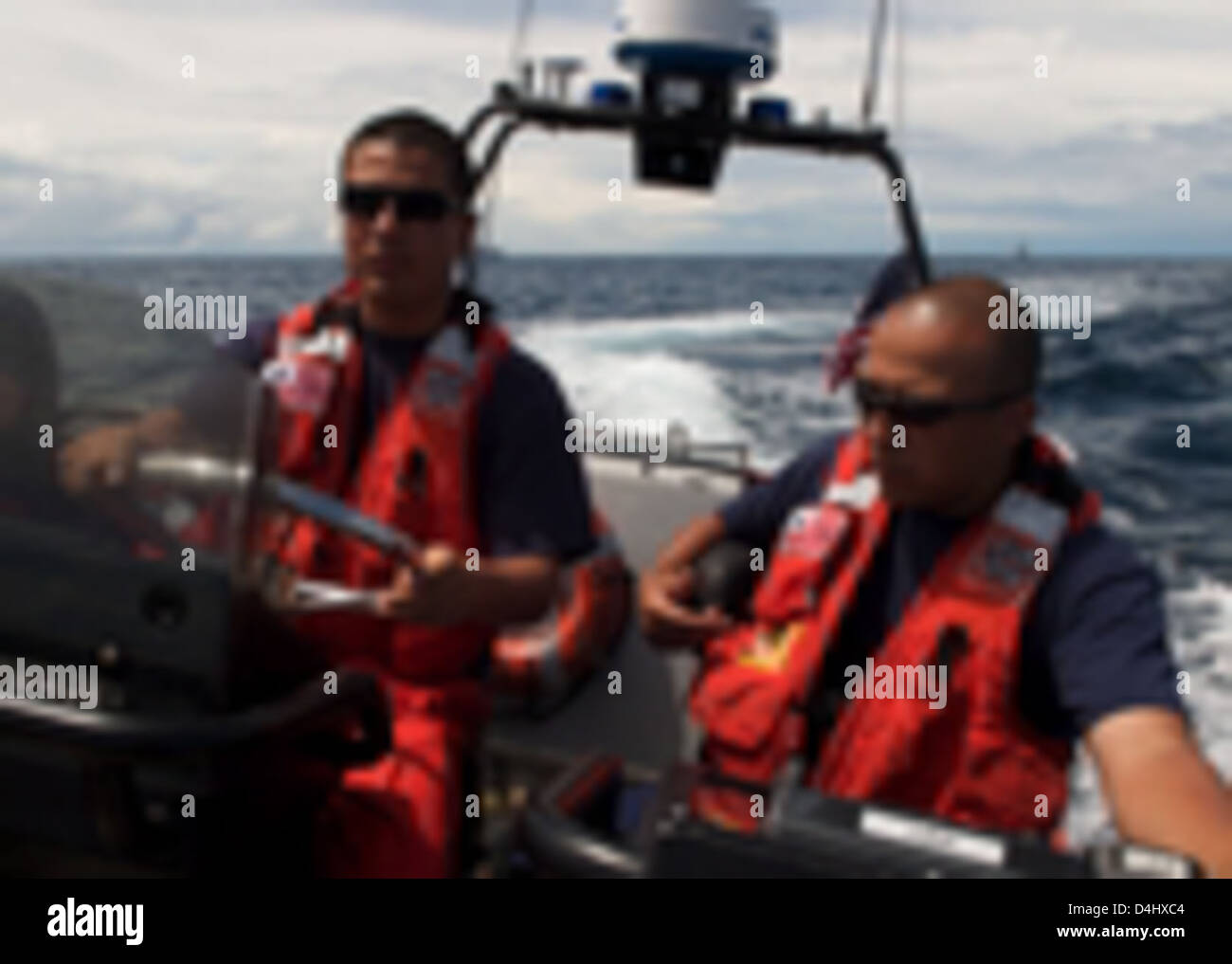 Bertholf boat crew Stock Photo - Alamy