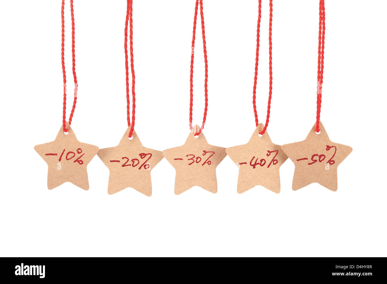 Discounts words spelled with paper stars are hung by ropes, isolated against white background Stock Photo