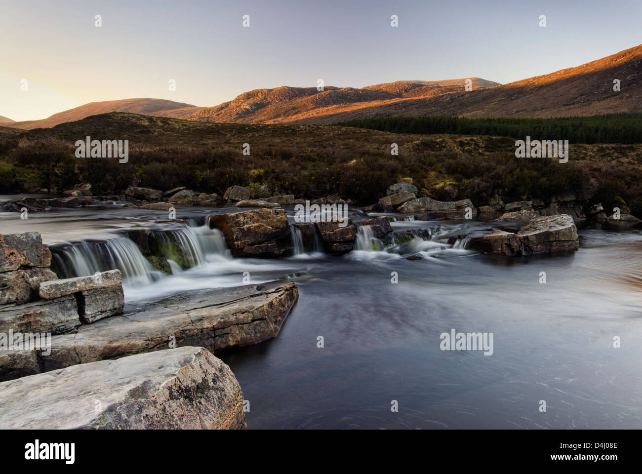 Early morning light on Droma River, Wester Ross, Highlands, Scotland. On the A835 road from Inverness to Ullapool. Stock Photo