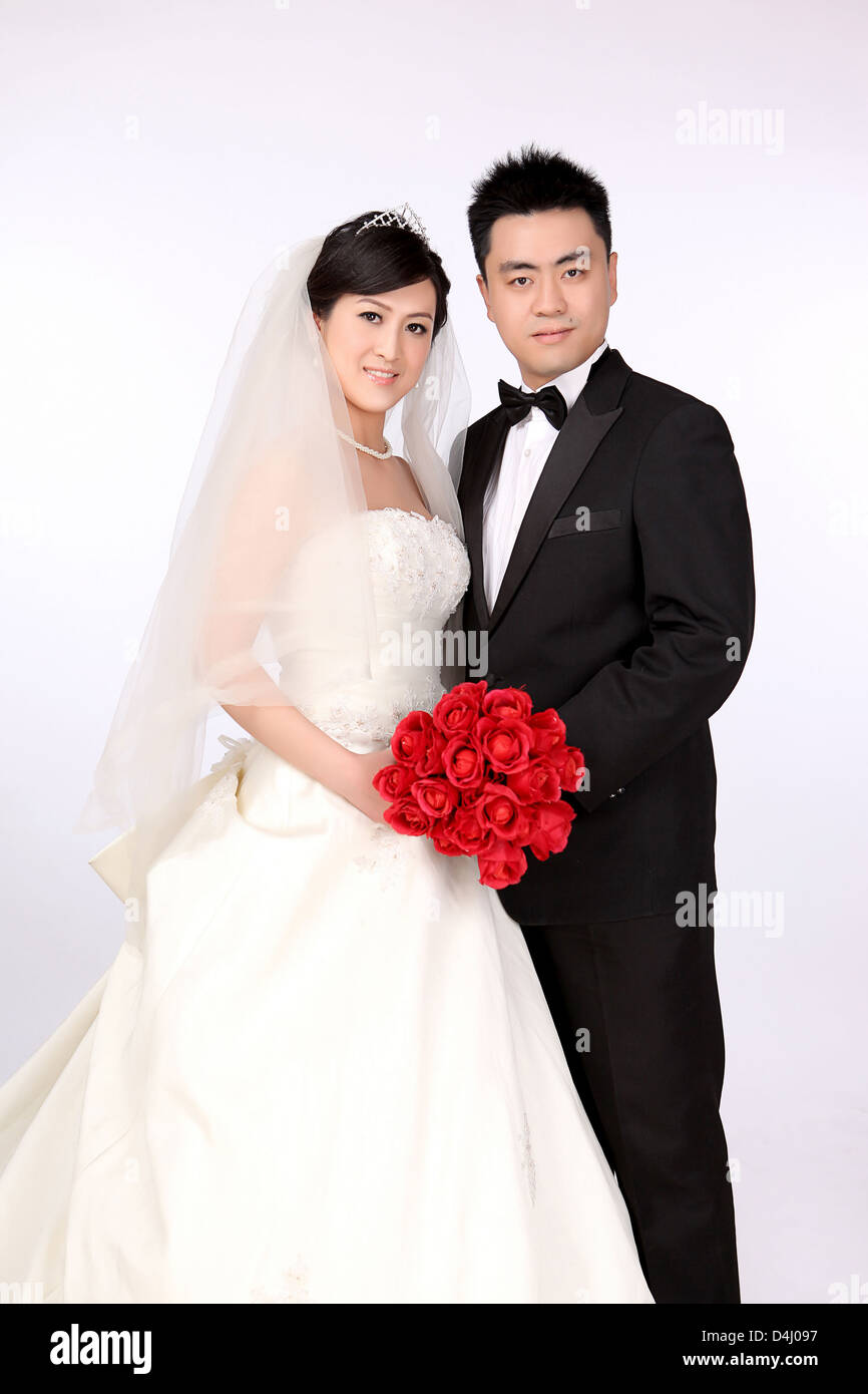 https://c8.alamy.com/comp/D4J097/photo-of-wedding-day-of-young-asian-couple-D4J097.jpg