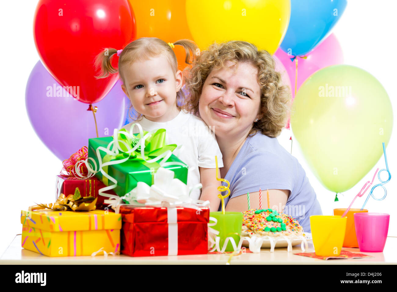little girl and mother celebrate birthday holiday Stock Photo