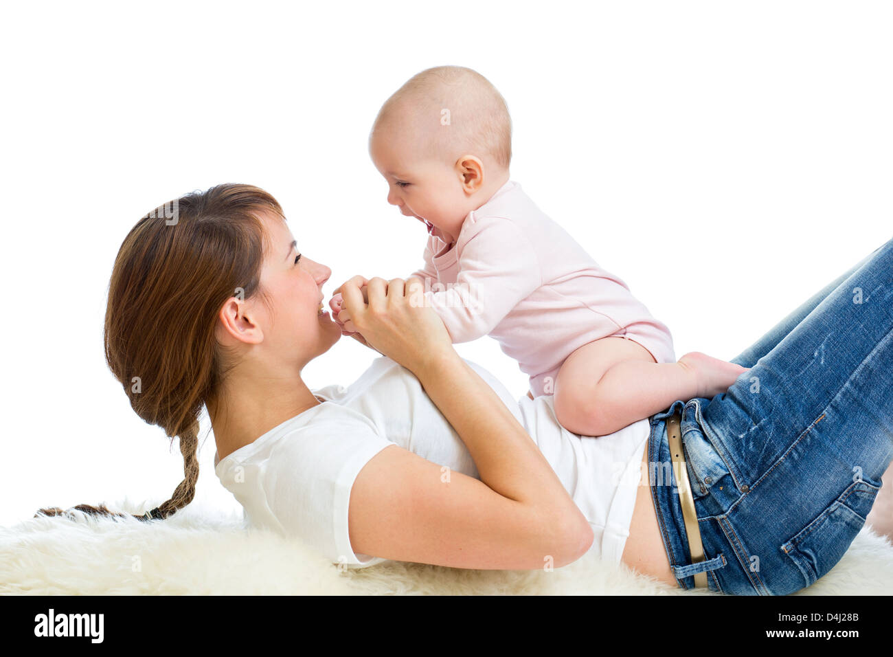 Loving mother having fun with her baby girl Stock Photo