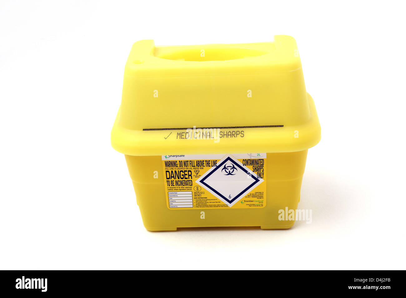 Yellow Sharps Bin For Medical Syringes Stock Photo Alamy