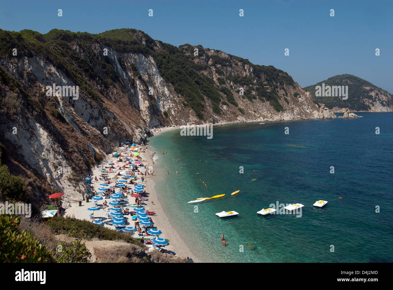Portoferraio, Italy, beach lovers at bay Sansone Stock Photo
