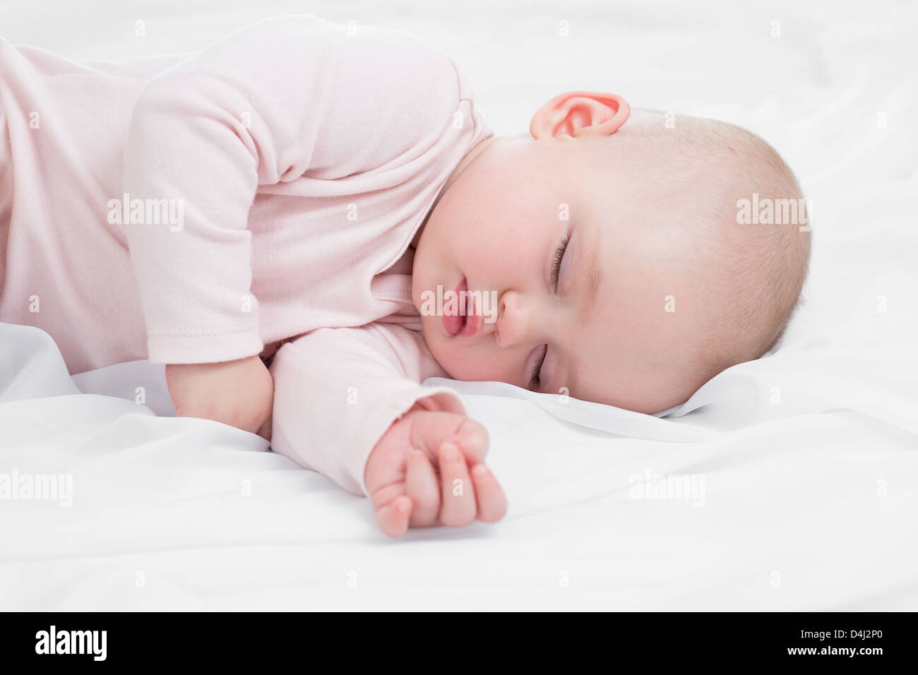 adorable baby sleeping on stomach Stock Photo Alamy